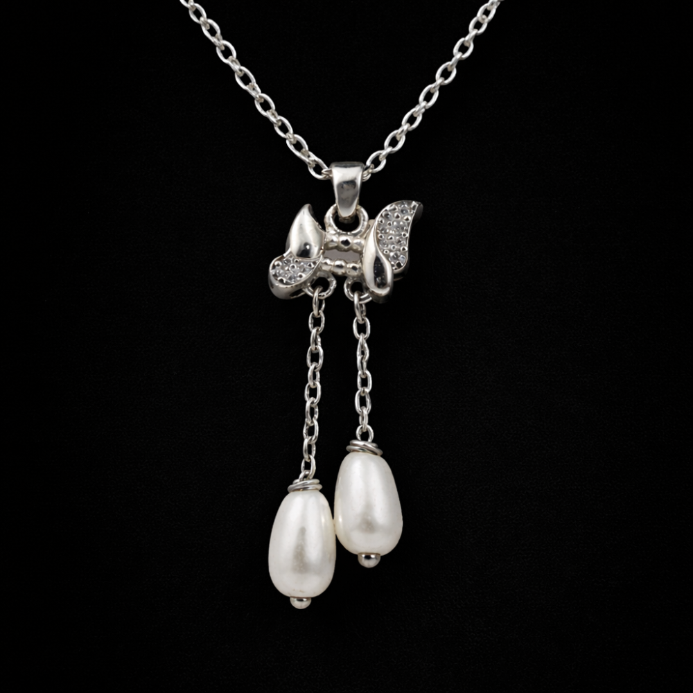 Butterfly pendant with pearls