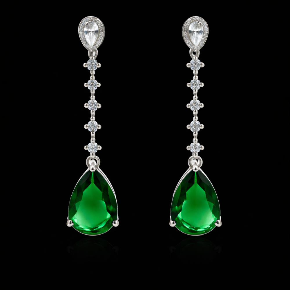 Elegant earrings with emeralds